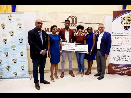 Celebrating with Jamaica Developers Association Scholarship recipients Durval Clayton (3rd left) and Briteny Byfield (3rd right) are Dr. Laurence Neufville (left), dean, Faculty of the Built Environment, University of Technology, Jamaica, Dr. Anetheo Jacks