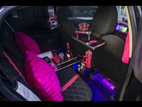 The modified interior of the 2012 Toyota Vitz features an array of personal touches, making the car unique and comfortable.