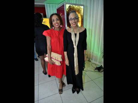 Collie Richards (left) and Justice Hilary Phillips smile for the camera.