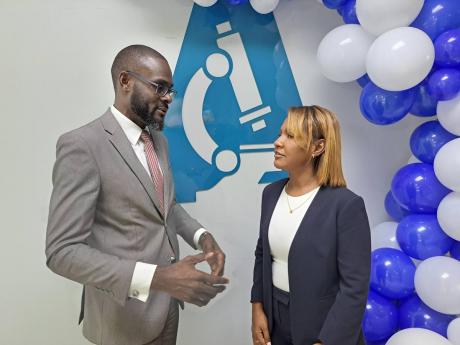 Oral Heaven (left), the president of the Montego Bay Chamber of Commerce and industry, and Dr Jodine Jackto-Tafari (right), the founder of the ACCULAB Diagnostic Centre in Montego Bay, engage in conversation shortly after the official launch and tour of th