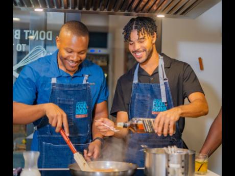 Digital creators Akeem Boothe (left) and Cole Nash take their butter salmon to the next level, infusing the soy ginger glaze with a splash of Johnnie Walker Black Label. 
