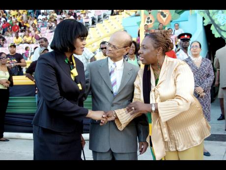 Credit: 2008 FILE PHOTO: Opposition Leader Portia Simpson-Miller (left) chats with Culture Minister Olivia Grange and Hugh Nash, chairman of the Jamaica Cultural Development Commission.