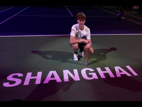 Jannik Sinner of Italy celebrates with his trophy after defeating Novak Djokovic of Serbia in the men’s singles final at the Shanghai Masters tennis tournament at Qizhong Forest Sports City Tennis Centre in Shanghai, China, yesterday.