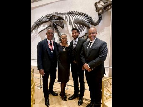 From left: Dr. Gervan Fearon, Dr. Kathy Moscou, Michael Fearon and Michael H. Tulloch, chief justice of Ontario and chair of the Advisory Council to the Order of Ontario.