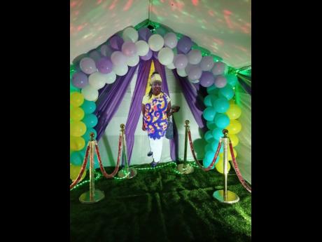 
A life-size cut-out of the late Colonel Marcia Douglas at her nine-night on Thursday, October 17, at Charles Town in Portland.