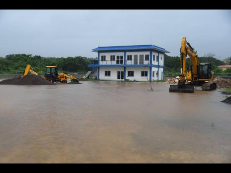 The Green Acres Police Station was flooded during the rains caused by the passage of Tropical Storm Rafael on Tuesday.