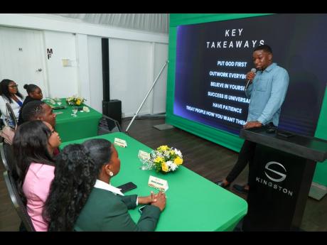 Business owner Romone Robinson delivers his presentation on how to stand out without breaking the rules during a ‘Pep Up’ session for Supreme Ventures Foundation’s 20th anniversary scholarship recipients at the Spanish Court Hotel in St Andrew.  