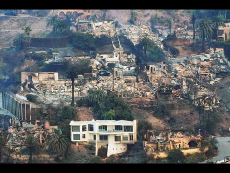 The devastation from the Palisades fire is seen from the air in the Pacific Palisades neighbourhood of Los Angeles on Thursday, January 9.