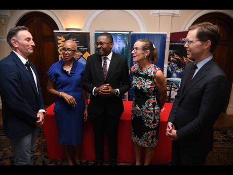 From left: Richard Davis, business development director at Lagan; Fayval Williams, minister of finance and the public service; Robert Morgan, minister without portfolio in the Ministry of Economic Growth and Job Creation with responsibility for works; Judi