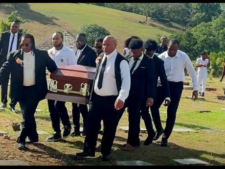 Pallbearers taking the coffin of Geneive ‘Ms Tibsy’ McIntosh to her final resting place at the Dovecote of St James Memorial Park after her funeral on Saturday.