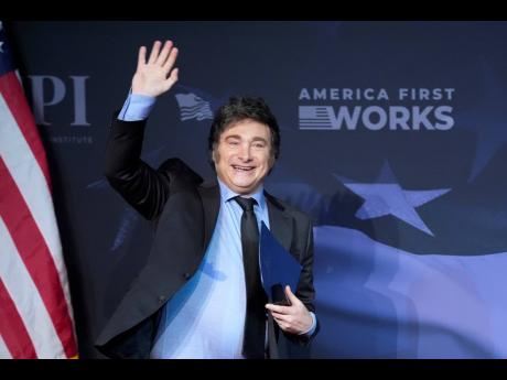 FILE - Argentina's President Javier Milei arrives to speak at Mar-a-Lago, November 14, 2024, in Palm Beach, Florida. (AP Photo/Alex Brandon, File)