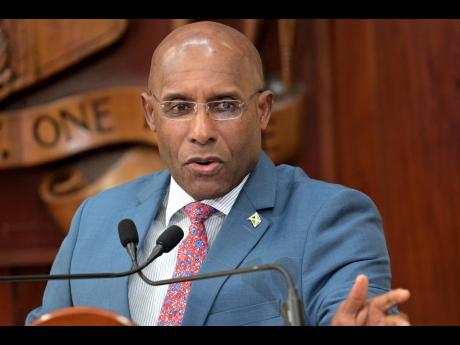 Credit: Rudolph Brown Minister of Industry, Investment & Commerce, Senator Aubyn Hill.