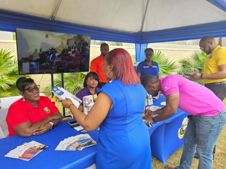 Credit: Contributed Participants at the exhibition booth at the Jamaica Customs Agency’s first lecture series and dialogue on Friday, January 31. The event featured the lecture series, panel discussion and booth exhibition.