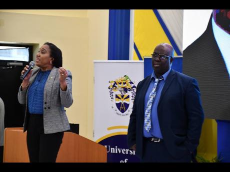 Credit: Contributed Dr Velma Ricketts Walker, CEO and Commissioner of Customs, and Professor Sean Thorpe, Dean of the Faculty of Engineering and Computing at UTech, speaking at the Jamaica Customs Agency’s first lecture series and dialogue for university students and academ