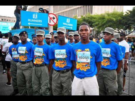 Credit: Matthew McKoy/Photographer Members of The Kingston College Cadet Unit await the start of the Sagicor Sigma Run 2025.