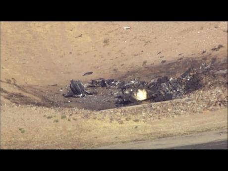 Credit: (KNXV via AP) In this image taken from video, plane debris seen from above at Marana Regional Airport after a deadly crash in Marana, Arizona on February 19, 2025.