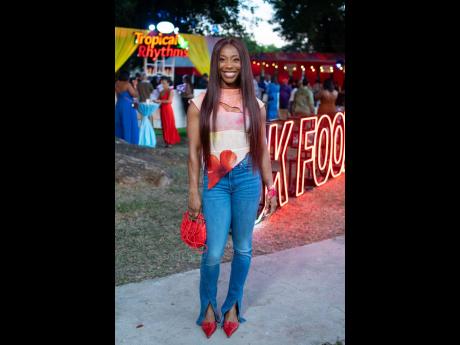 Credit: Contributed Shelly-Ann Fraser-Pryce understood the assignment! The Olympian and GraceKennedy Group brand ambassador stuns in this chic red accented outfit.