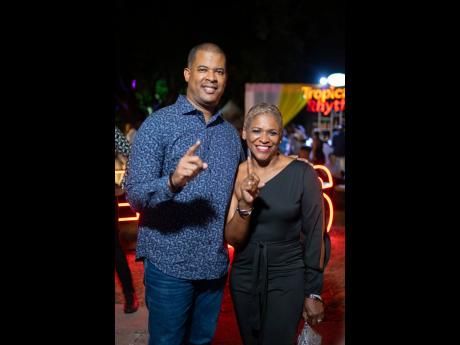 Credit: Contributed Newly appointed GraceKennedy Group Chief Executive Officer Frank James shares the frame with Andrea Coy (right), Grace Foods chief executive officer.