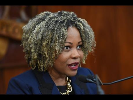 Dr Dana Morris Dixon, minister of education, skills, youth and information, addressing yesterday’s post-Cabinet press briefing at Jamaica House in St Andrew. 