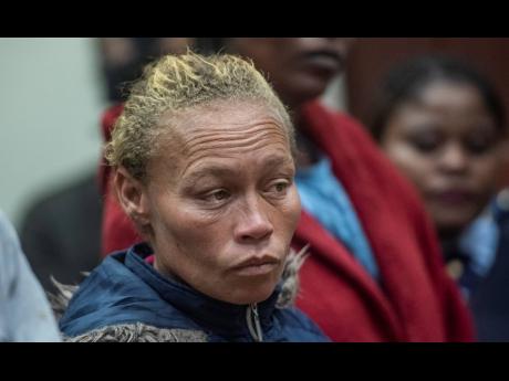 Credit: The mother of missing 6-year-old Joslin Smith, Kelly Smith, appears in court in Vredenburg, South Africa, Thursday, March 7, 2024. Smith has been charged with kidnapping and selling or trafficking her daughter in a shocking twist in a case that has enraptu