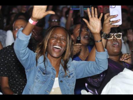 Patrons have the time of their lives at the Boyz II Men Concert on Saturday at UWI Bowl Mona, St Andrew, last October.