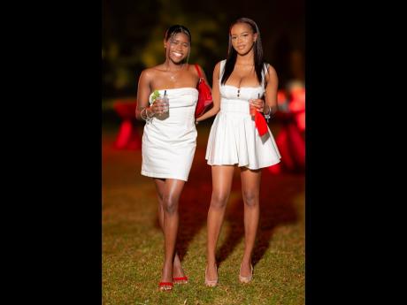 Credit: Contributed Above: Doubling the glam and sweetness are Norman Manley Law School students Maya Curtis (left) and Alanis Hyman.