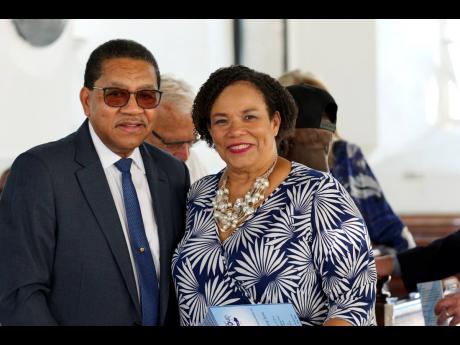 Seaboard Jamaica’s first CEO Grantley Stephenson (left) shares lens with current CEO Corah Ann Robertson-Sylvester at the company’s recent event to celebrate 25 years of operations in Jamaica.