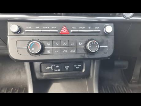 The Tucson’s climate control system features intuitive touch controls for easy adjustments, ensuring comfort in any weather.