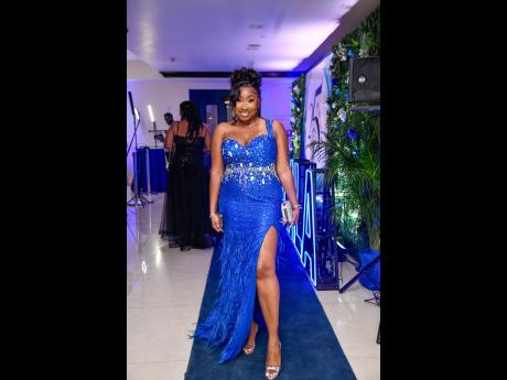 Credit: Matthew McKoy Britney Barrett, anti-money laundering analyst at COJ, is the moment in this split-detail gown from NewYorkDress.