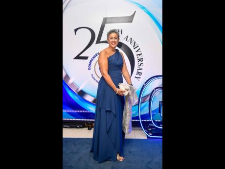 Credit: Matthew McKoy With a smile that lights up the room, Gina Phillipps Black pauses for a quick photo.