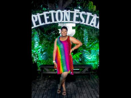 Sasher-Gaye Miller donned a multi-coloured shift dress. 