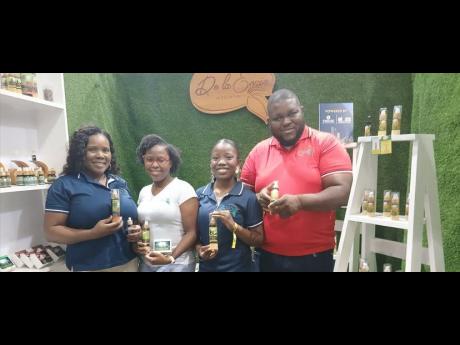 Credit: Paul Williams From left: De la Enzie’s Essentials’ Samantha Douglas, general manager: Jevona Delahaye, operations and product manager: Brittania Mitchell, sales representative; and Justeen Brown, customer service manager, displaying some of the company’s products