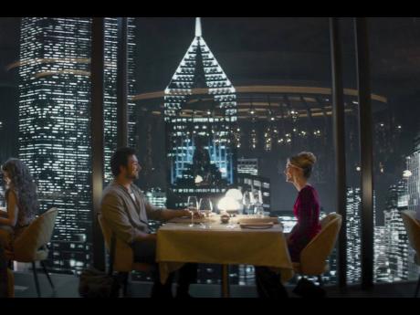 Credit: AP This image released by Universal Pictures shows Brandon Sklenar and Meghan Fahy in a scene from ‘Drop’.