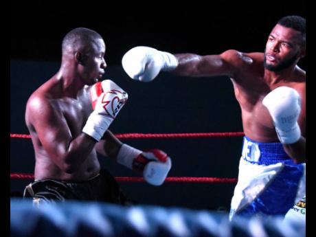 Credit: Ian Allen Jaden Eccleston (right) and Kevorna Willis battle each other during an amateur bout on the Gloves over Guns fight card at the Stanley Couch Gym on Saturday, February 23, 2025.