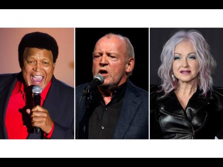 Credit: AP/File This combination of photos shows Chubby Checker at the Songwriters Hall of Fame Awards in New York on June 12, 2014, lef; British singer Joe Cocker performing in Monaco on August 5, 2011, centre; and Cyndi Lauper at the MTV Video Music Awards in New York o