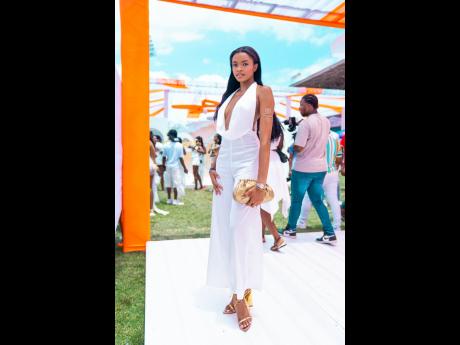 Shiann Excell, second runner-up, Miss Universe Jamaica East, decides on a minimalist look with golden accents for the occasion.