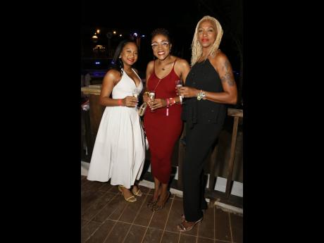 Credit: Nathaniel Stewart Making it a girls’ night out are (from left) Natalie Brown, accountant; Shelly-Ann Weeks, executive director, HerFlow Foundation; and Asoya Barrett, stylist.