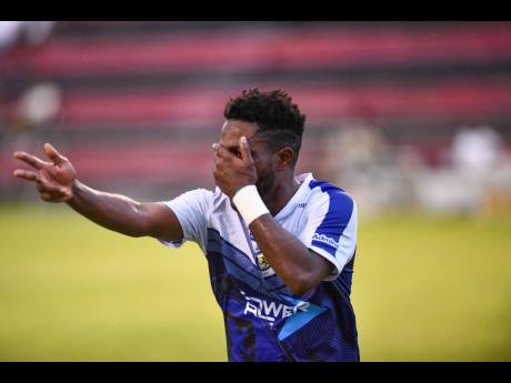 Credit: Matthew McKoy Mount Pleasant’s Haitian import, Angelo Exillus, celebrates a goal against Chapelton Maroons during a Jamaica Premier League game at the Anthony Spaulding Sports Complex on April 14.