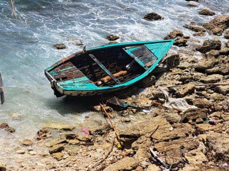 The 20- foot boat, which transported approximately 40 people to Jamaica's shore on Sunday.