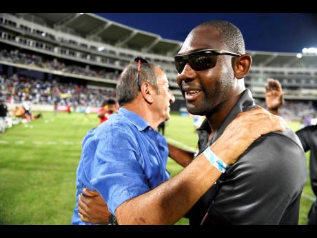 Credit: File Davion Ferguson (right), assistant coach at Mount Pleasant Academy with club owner Peter Gould.