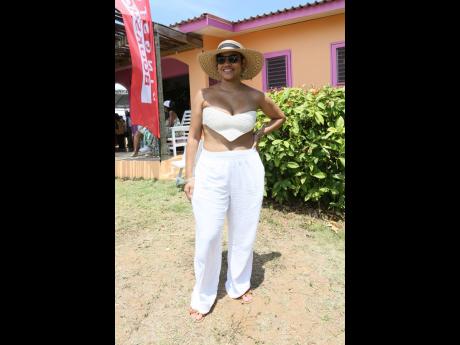 Visual artist Gillian Chen says ‘yes’ to style and comfort, pairing Old Navy pants with a self-made top and a hat by the ‘Hat Man’ from 7 Mile Beach.


