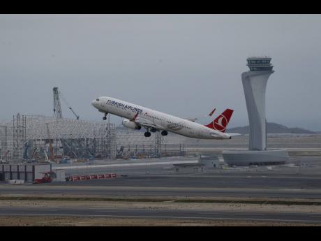 Credit: AP Lefteris Pitarakis A Turkish Airlines plane takes off from Istanbul Airport near the Black Sea shores, in Istanbul, on April 6, 2019.