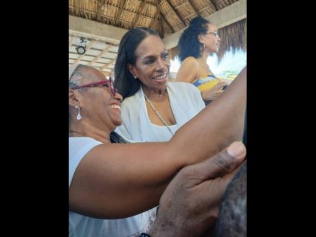 Credit: Paul Williams A patron smiles as she gets her selfie with awarding singer and actress Sheryl Lee Ralph on Sunday, May 25.