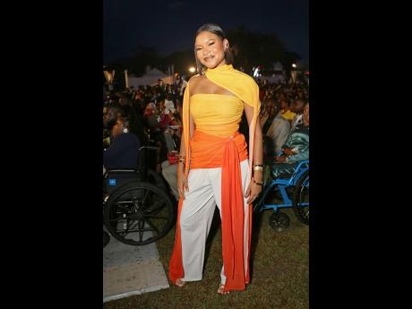 Anna-Lisa Gutherie, costume and production designer, was decked in fine style, wearing a stunning yellow and orange BBXBRAND off-the-shoulder top, paired with white Zara pants and Gucci heels just moments before gracing the stage to collect her Prime Minis