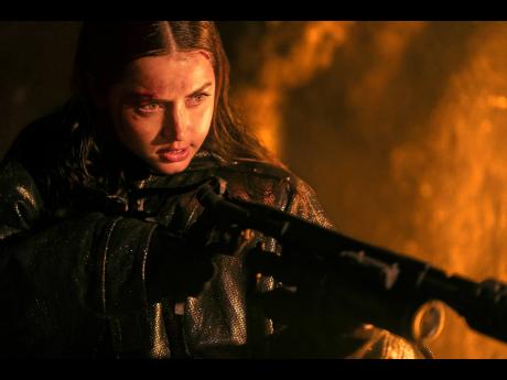 This image released by Lionsgate shows Ana de Armas in a scene from ‘Ballerina’. 