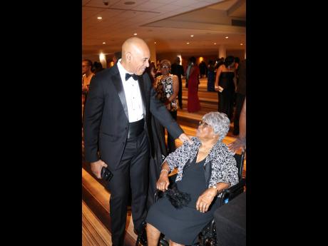 Credit: Derrick Scott Ambassador of Jamaica to the United States Major General (Ret’d) Antony Anderson offers birthday greetings to 91-year-old grandma Claire Keise, who hails from Bamboo, in the parish of St. Ann but now resides in Atlanta, Georgia. They were both at the Int