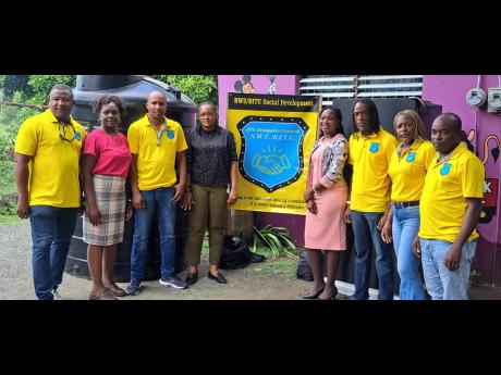 The JPS-NWU delegates team posing with school administrators.