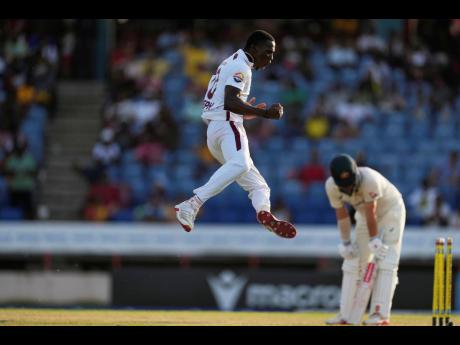 Credit: AP
West Indies’ Shamar Joseph celebrates taking the wicket of Australia’s Travis Head on day three of the second cricket Test match at the National Cricket Stadium in St George’s, Grenada, yesterday.
