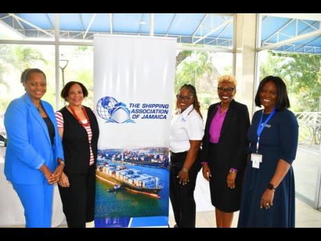 President of the Shipping Association of Jamaica (SAJ), Corah Ann Robertson-Sylvester (second left), shares a moment with (from left) Delaine Morgan, manager of exporter facilitation at JAMPRO; Jean Hinds-Bell, SAJ’s internal audit and strategic services