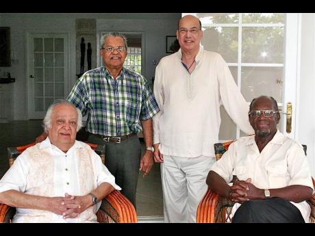 Credit: Courtesy Ronald Sanders (From left) The late Sir Shridath 'Sonny' Ramphal, the late Rickey Singh, Sir Ronald Sanders and Hubert Williams, Rickey’s longtime friend and fellow journalist pose for a photo.